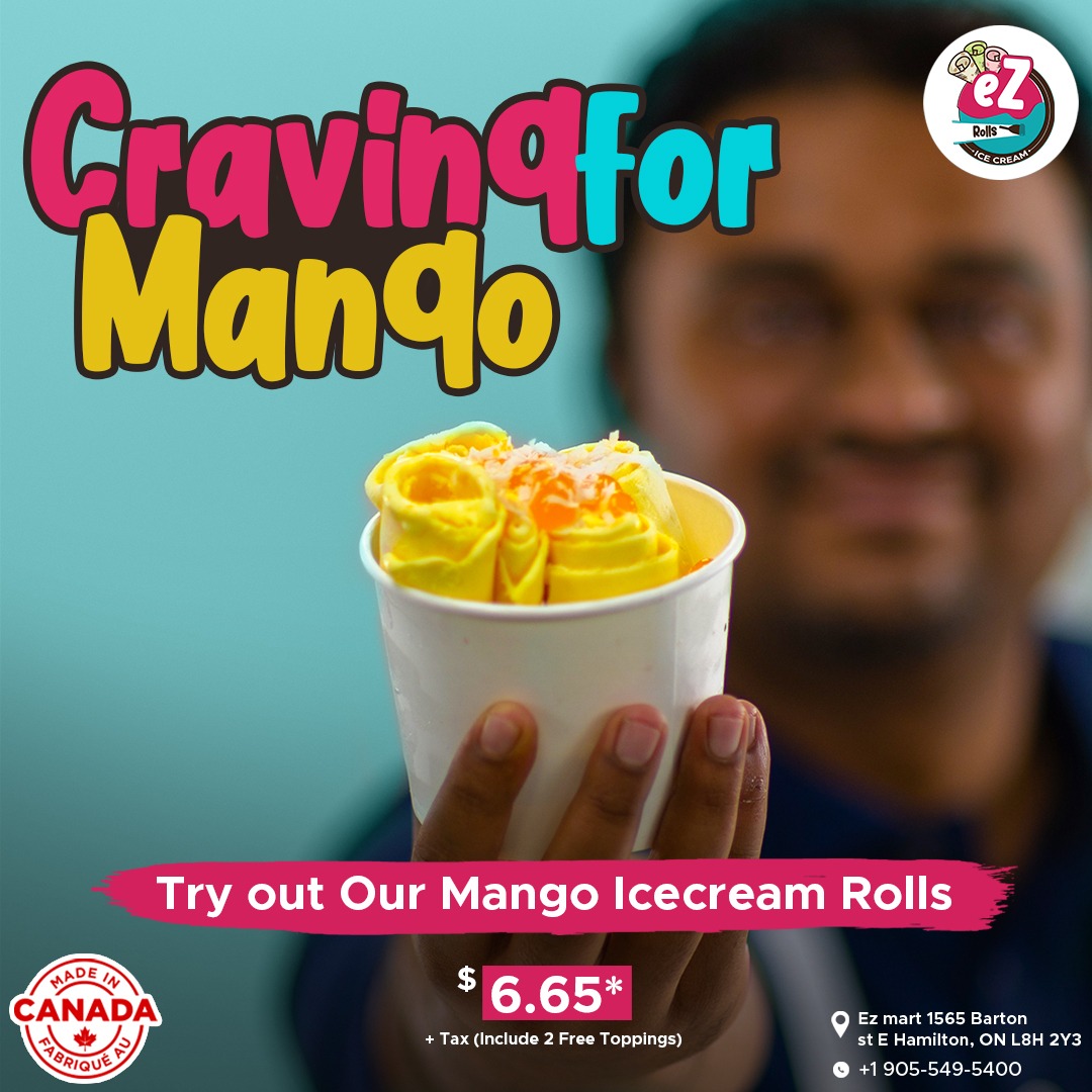 Mango ice cream rolls held by the owner, made with fresh mango